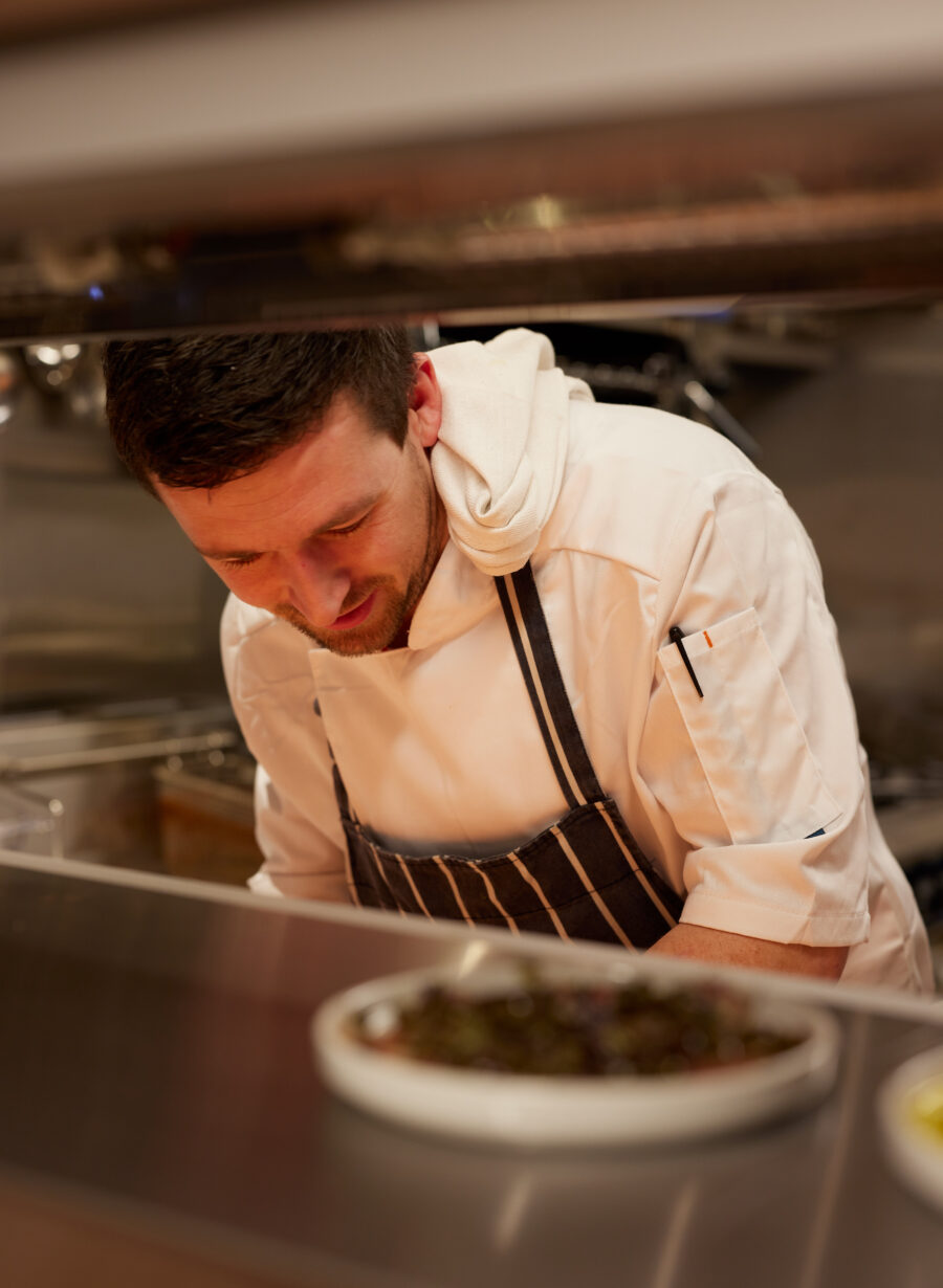 chef preparing food in kitchen