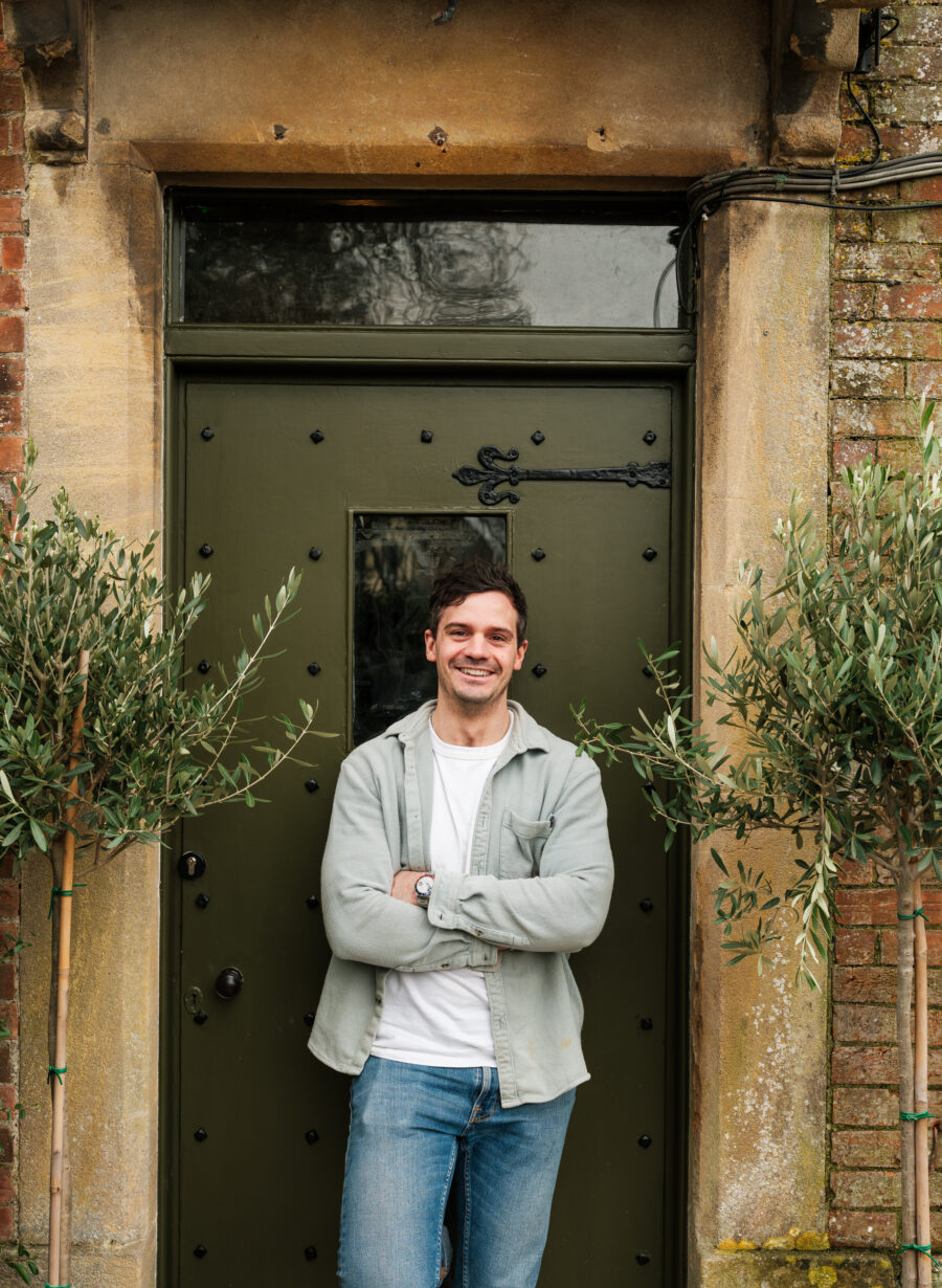 welcoming staff member at pub entrance
